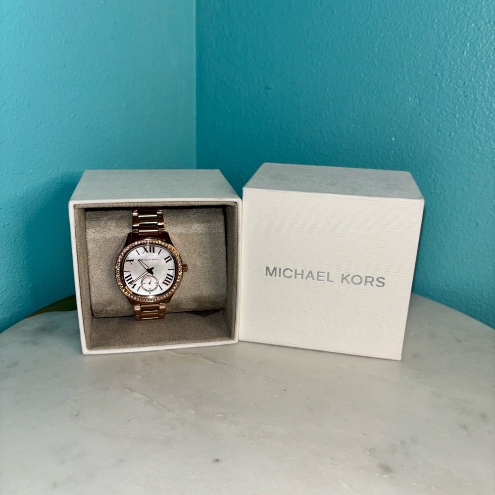 Michael Kors Rose Gold watch with pearl and glow in the dark arrow, bling
